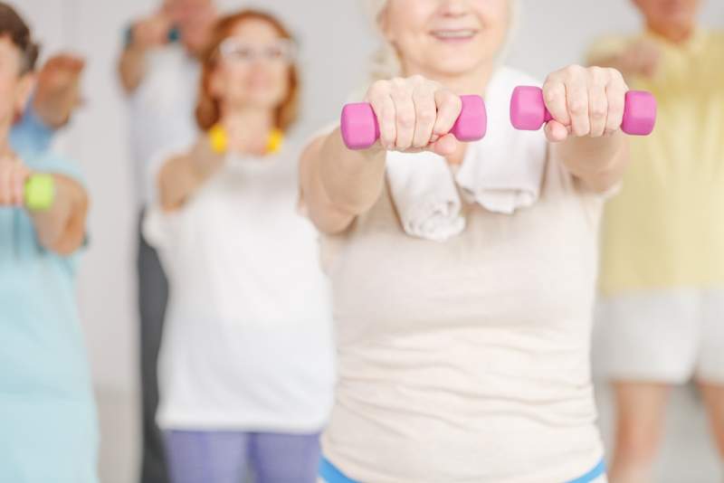 exercising-shoulders-with-dumbbells